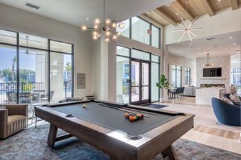 Resident e-lounge with coffee bar, game room & coworking stations